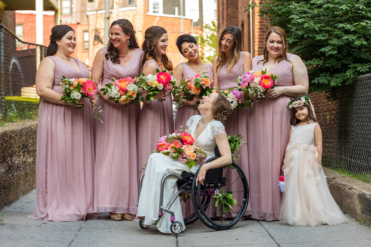 bride with bridesmaids blush dresses colorful flowers The LINE Hotel DC spring wedding - Havard Events DC Northern Virginia Wedding Planner