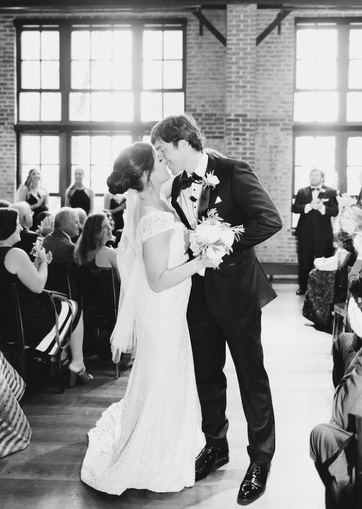 just married aisle kiss - Ritz Carlton Georgetown DC wedding Lisa Havard Events