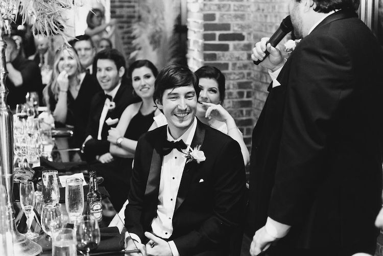 groom reaction black and white wedding reception with pampas grass Ritz Carlton Georgetown DC wedding Lisa Havard Events