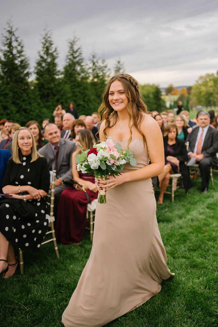 bridesmaid walking into ceremony taupe dress neutral wedding - Loudoun County wedding Lisa Havard Events