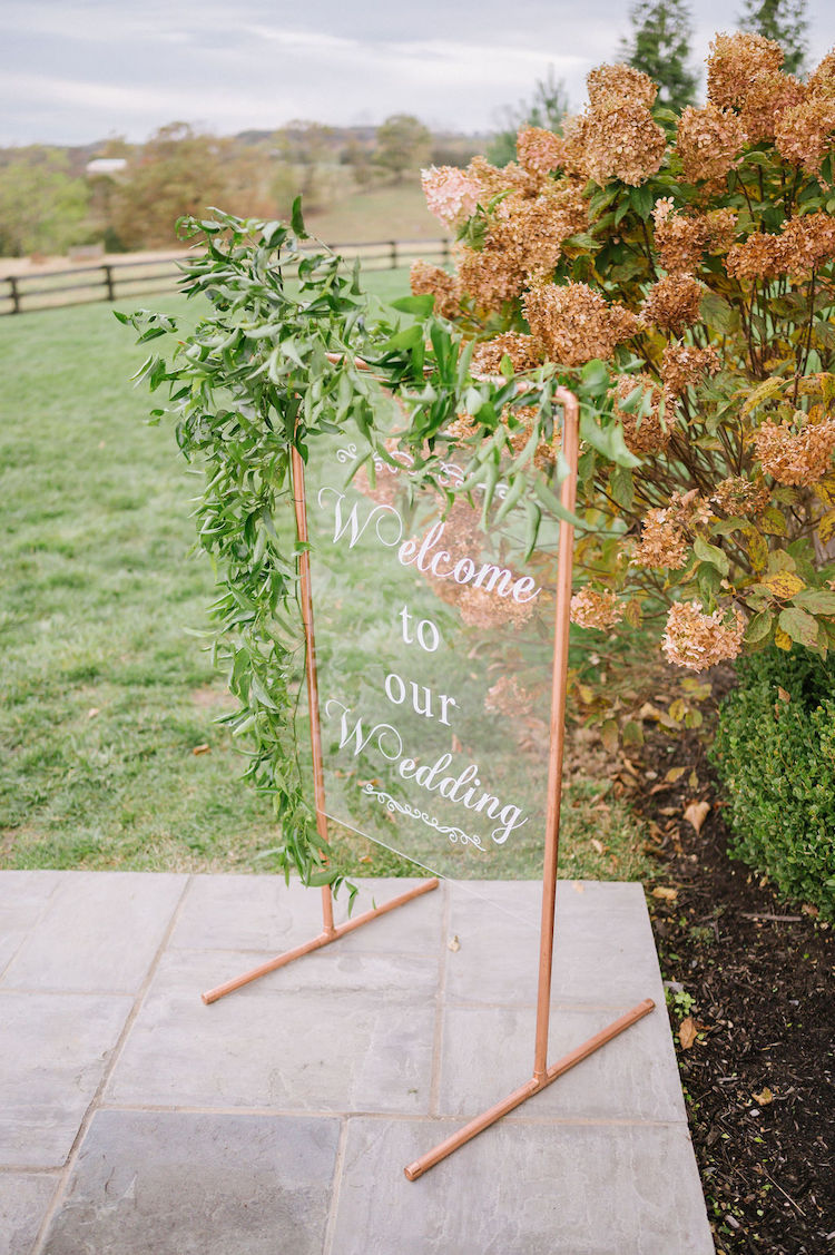 clear acrylic welcome sign in copper frame - Loudoun County wedding Lisa Havard Events