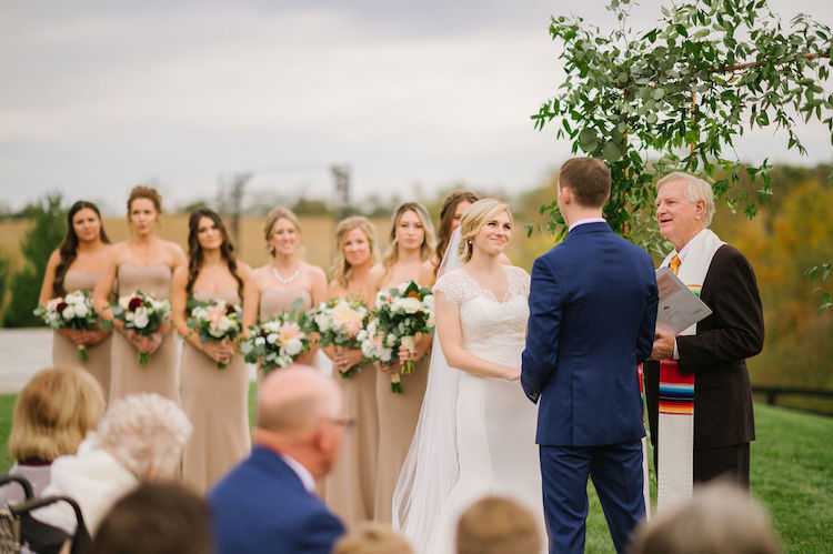 outdoor ceremony simple copper and greenery backdrop bridesmaids in beige neutral wedding - Loudoun County wedding Lisa Havard Events