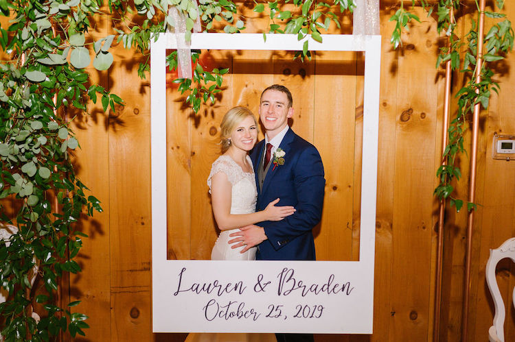 bride and groom in polaroid photo booth - Loudoun County wedding Lisa Havard Events
