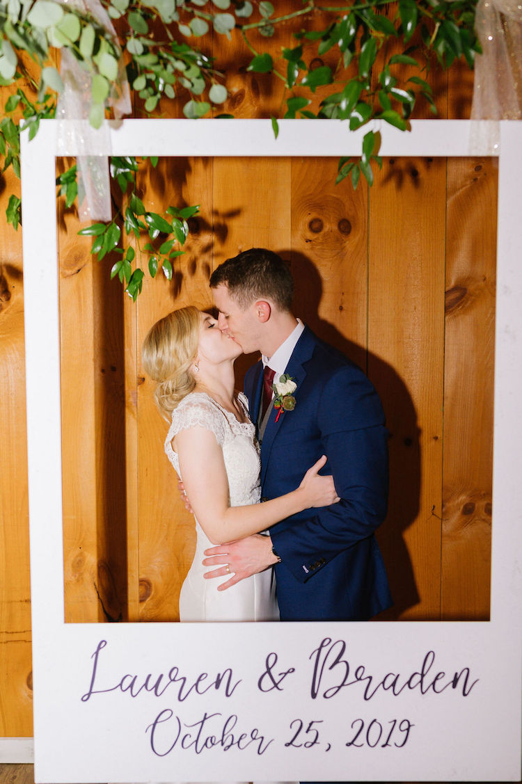 bride and groom kiss in polaroid photo booth - Loudoun County wedding Lisa Havard Events