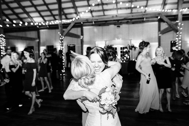 bride hug with bouquet catcher - Loudoun County wedding Lisa Havard Events