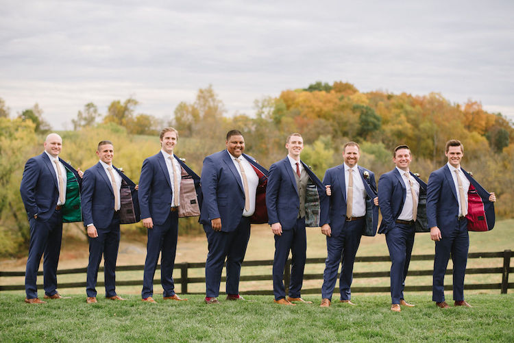 groom with groomsmen in navy with colorful jacket linings modern neutral fall wedding - Loudoun County wedding Lisa Havard Events