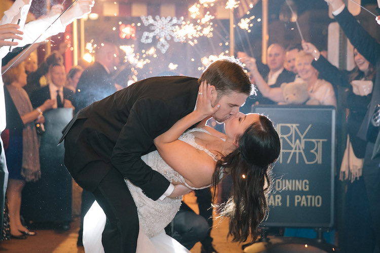 bride and groom kiss sparkler sendoff - havard events dc wedding coordinator